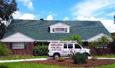 Residential Home with an Chateau Green Asphalt Shingle Roof replacement in Lakeland, FL.