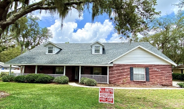Residential Home with an Quarry Grey Asphalt Shingle Roof replacement in Lakeland, FL.