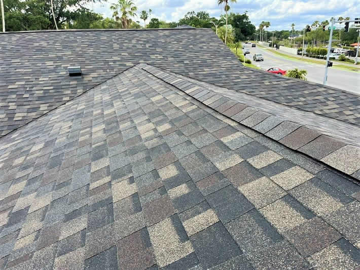 Expertly installed shingle roof with ridge vent by roofing professionals in Lakeland.